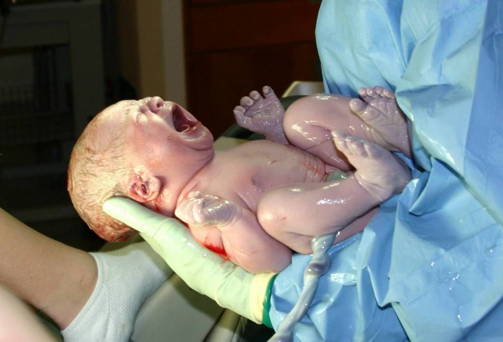 newborn-child-seconds-after-birth-umbilical-cord-has-not-yet